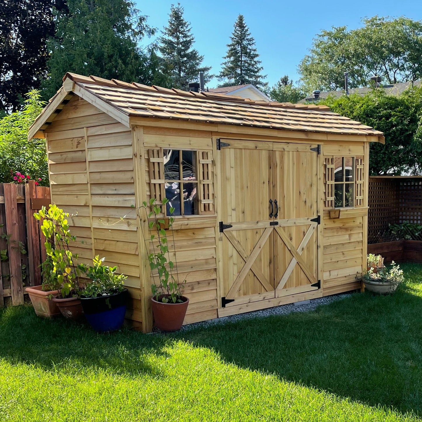 12 foot by 6 foot longhouse with double doors windows and window boxes