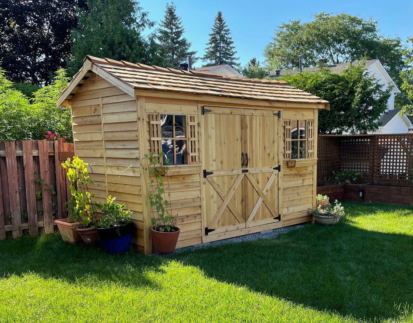 12 foot by 6 foot longhouse with double doors windows and window boxes